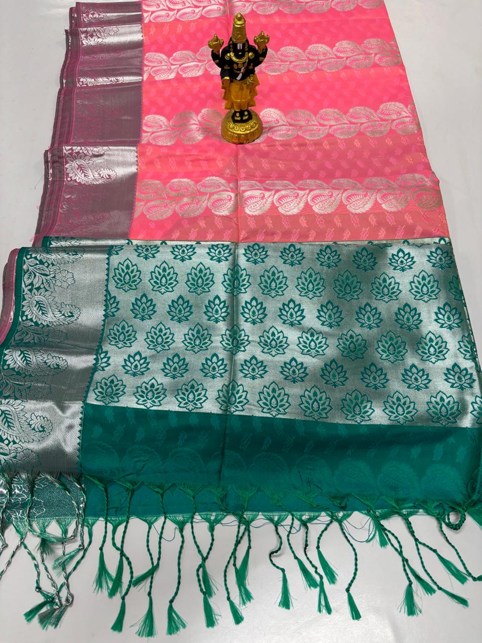 Coral pink and green Elampillai saree with silver zari woven border