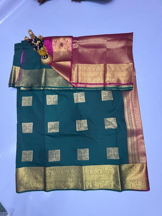 Deep Pine Green Elampillai saree with gold box motifs and maroon border.