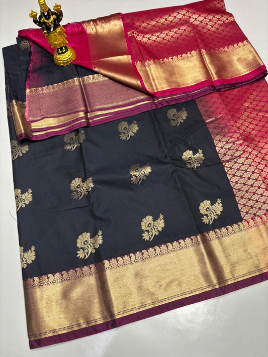 Charcoal Black Elampillai saree with gold floral buttas and magenta border.