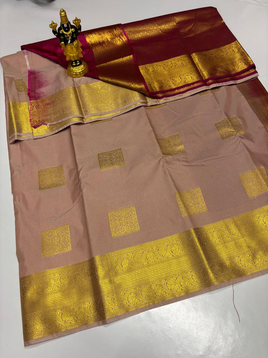 Dusty rose Elampillai silk saree with wine red gold zari border and square buttas.