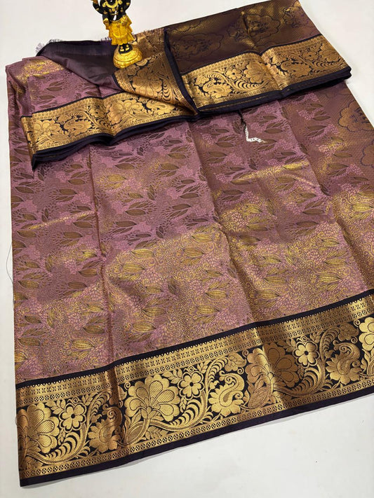 Mauve silk saree with dark purple peacock Zari border