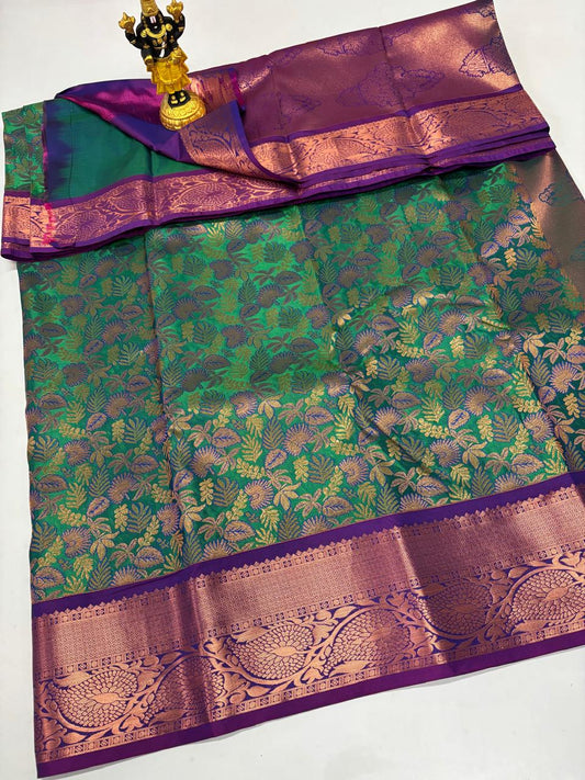 Deep teal silk saree with copper Zari work