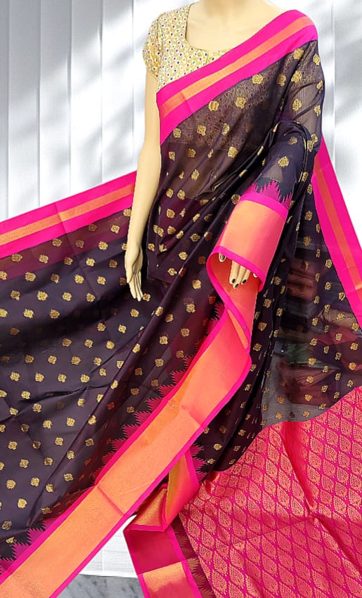 Deep plum Elampillai saree with rani pink zari border and gold butta work.