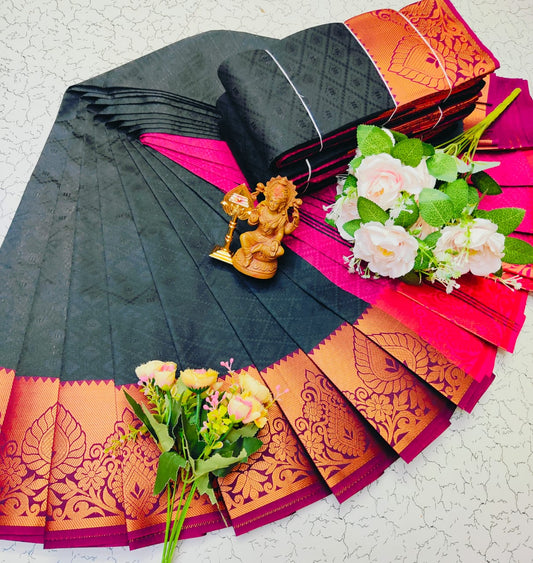 Dark grey saree with pink zari border and textured body