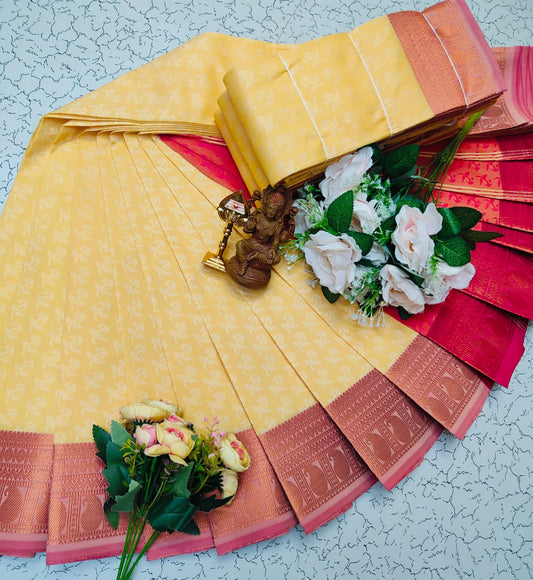 Cream yellow saree with rose gold zari border