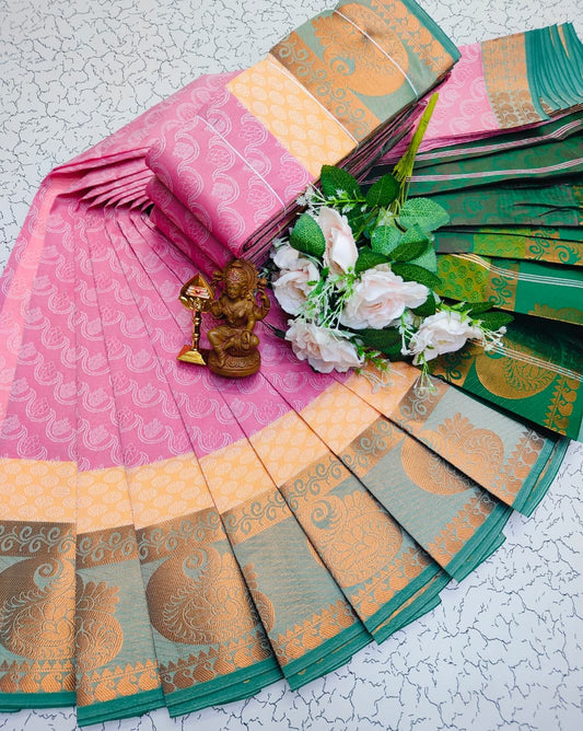 Blush pink saree with teal and gold zari border