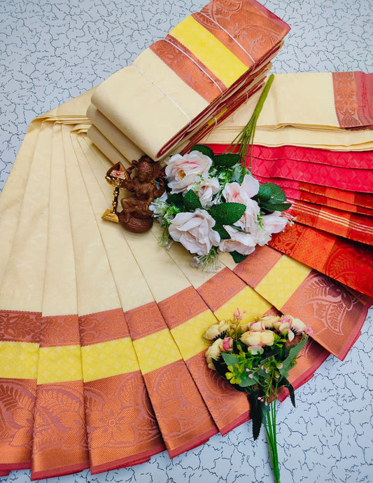 Cream saree with copper and yellow zari border
