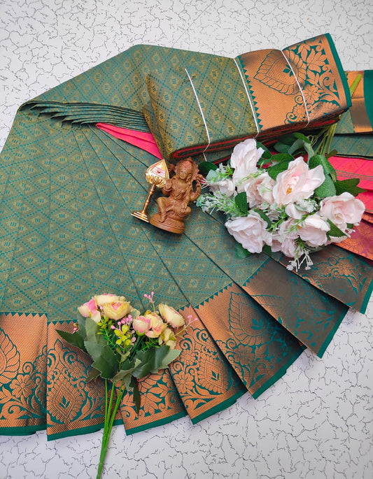 Bottle green saree with copper zari border